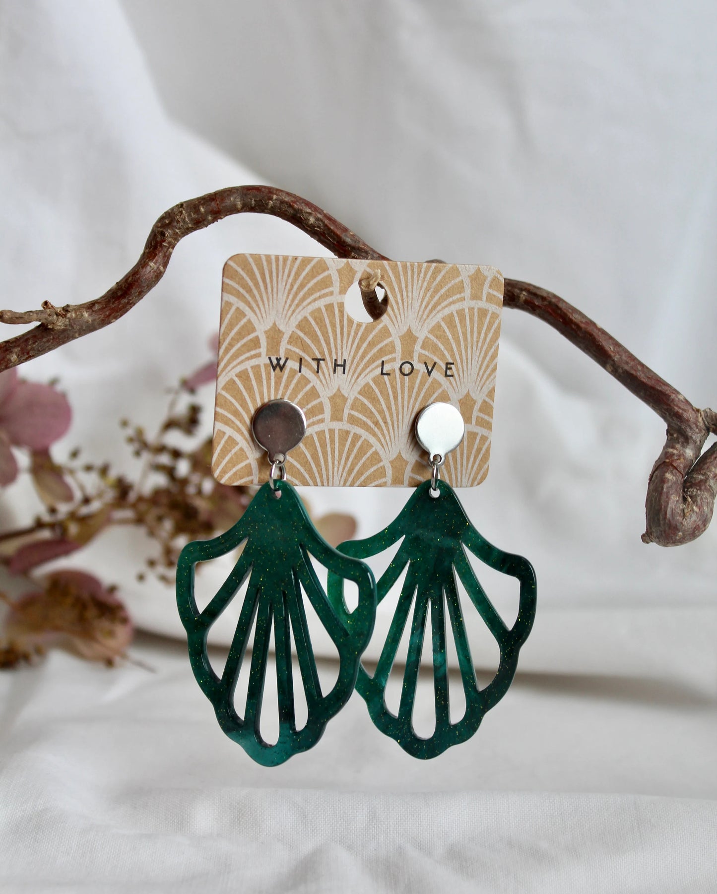 Earrings with resin ornament in petrol