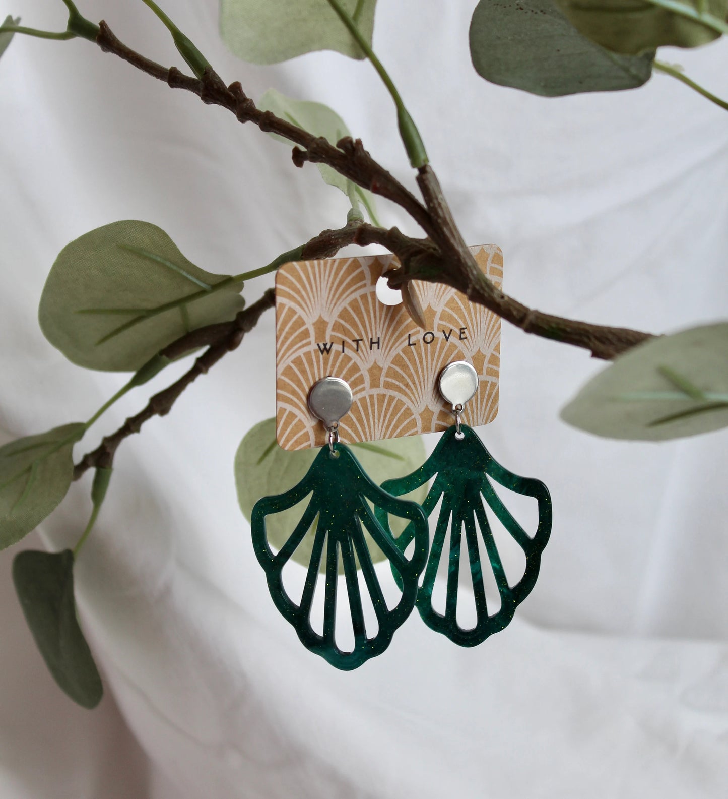 Earrings with resin ornament in petrol