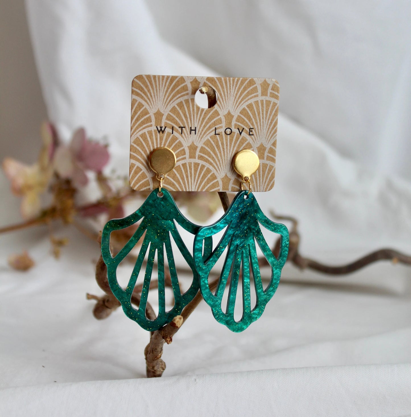 Earrings with resin ornament in petrol