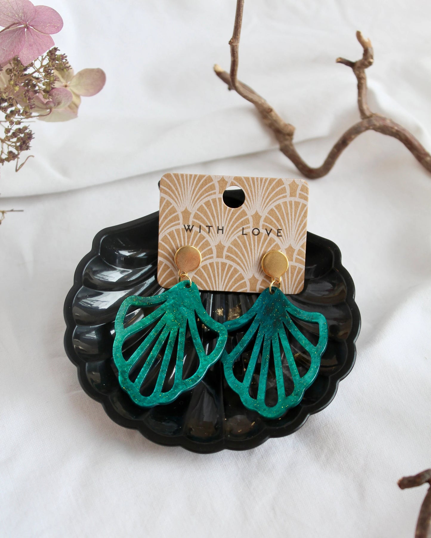 Earrings with resin ornament in petrol